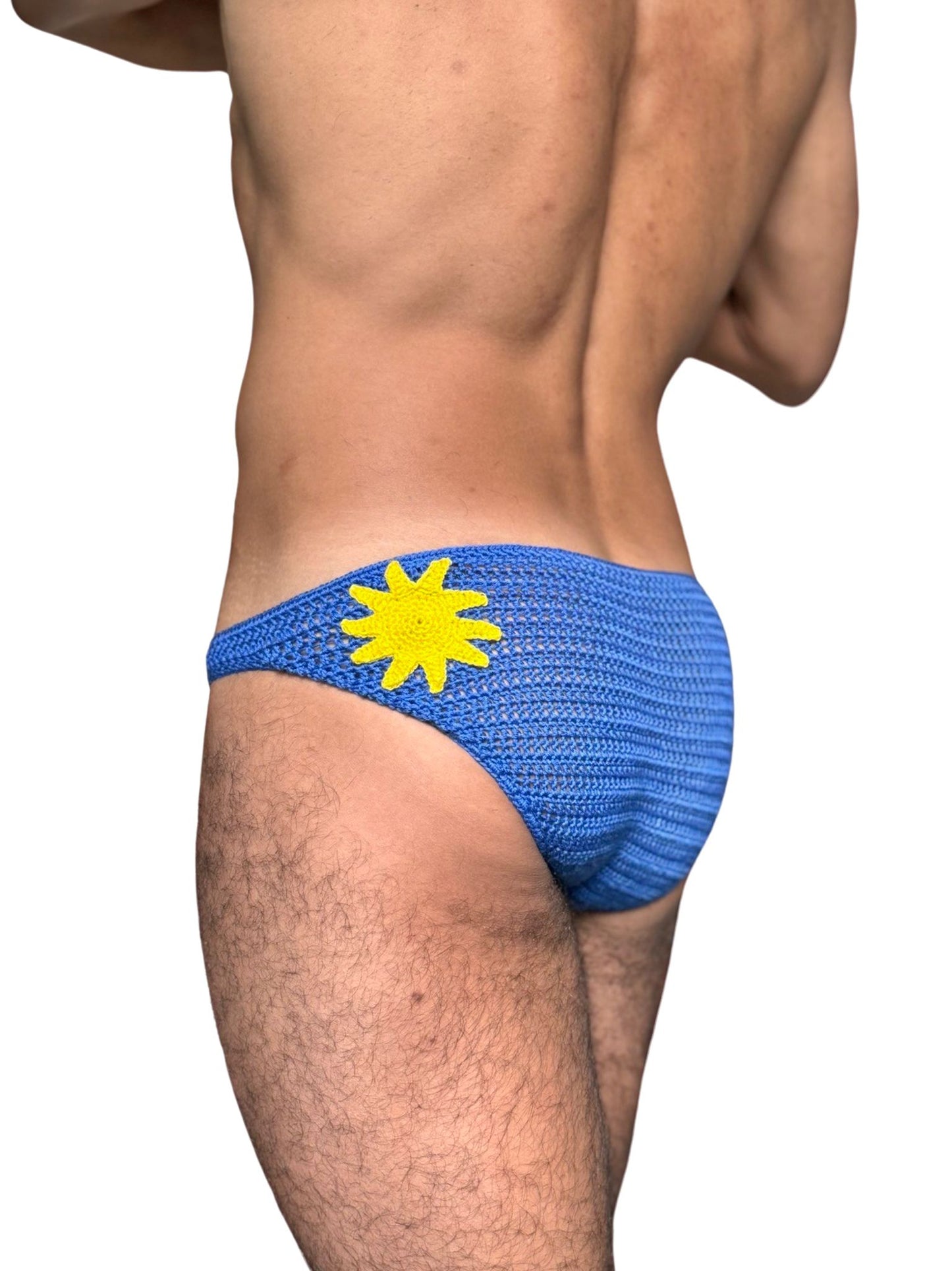 Side view of men’s crochet sun swim briefs, highlighting airy mesh structure and comfortable fit.
