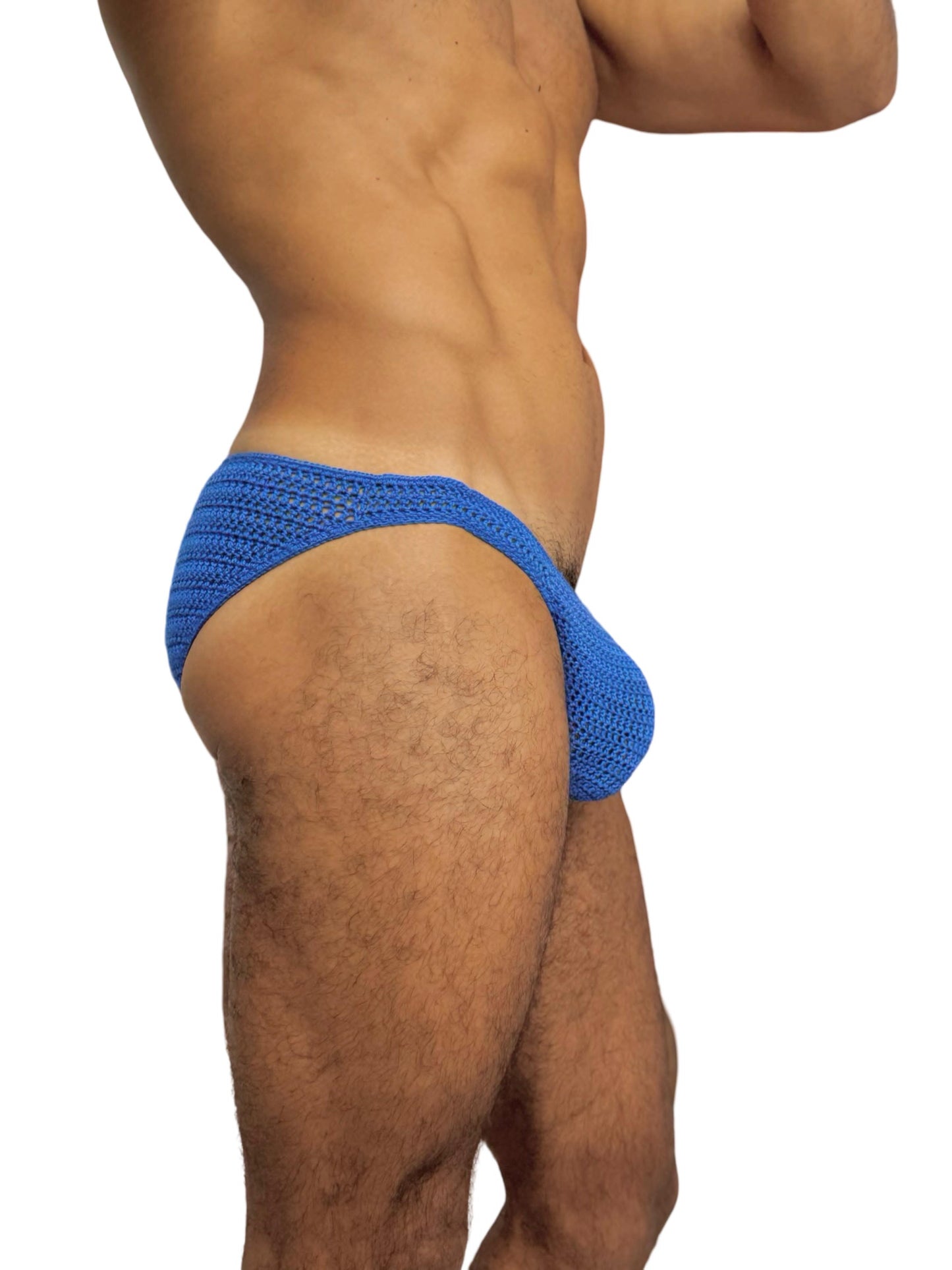 Detail shot of yellow sun crochet design on pouch area of men’s swim briefs.