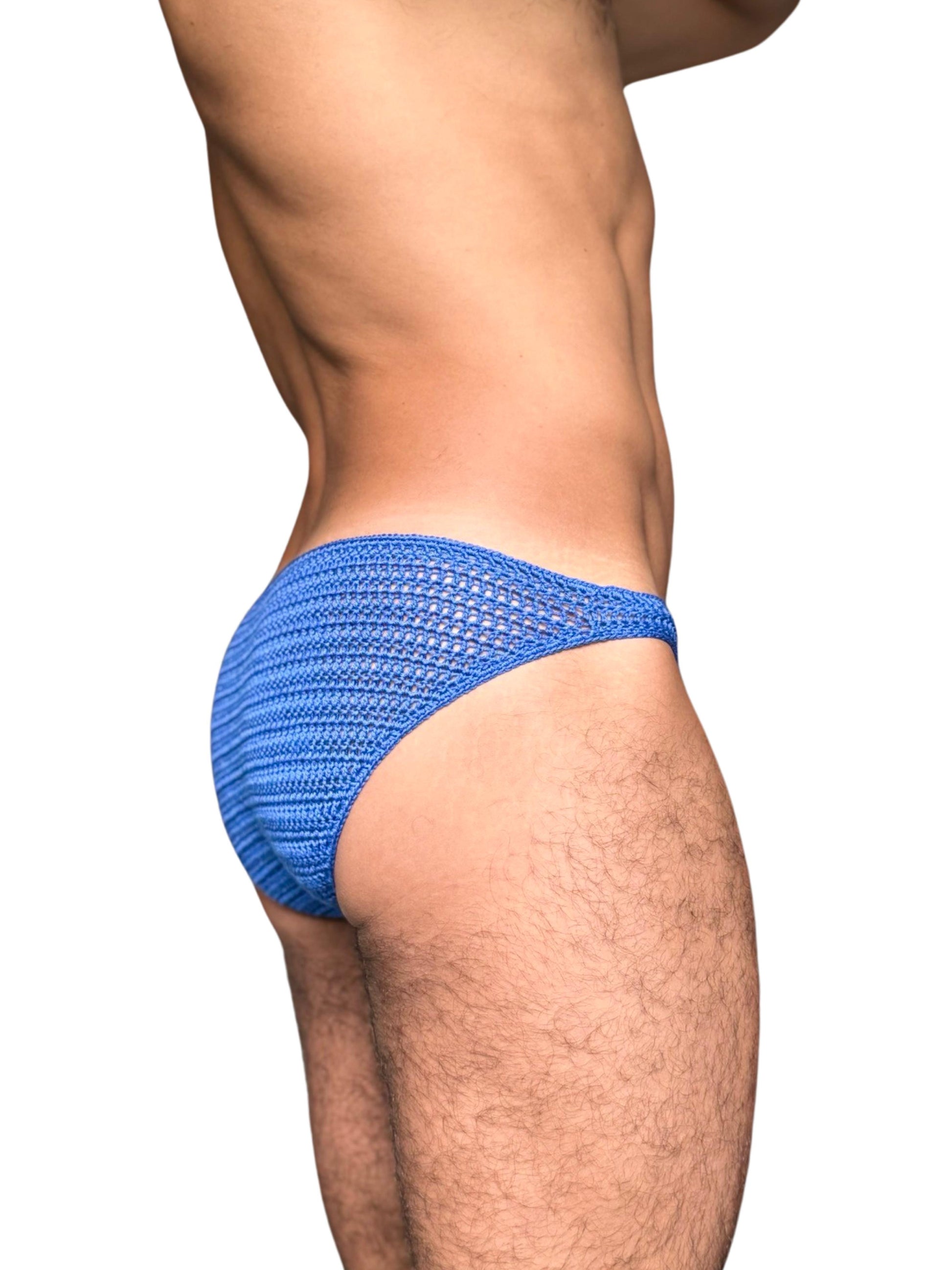 Studio photo of crochet men’s sun briefs displayed on a man, showing fit and design.