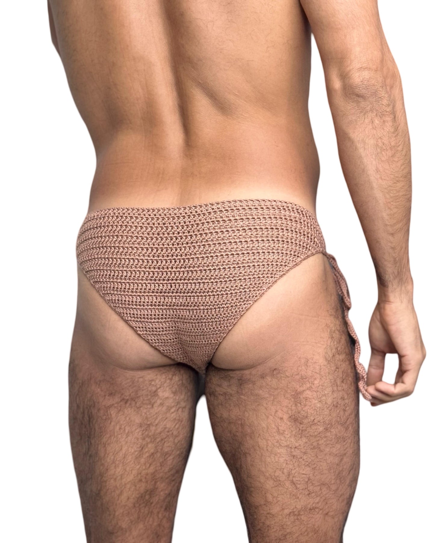 Back view of men’s crochet briefs with side ties, highlighting secure fit and handmade pattern.