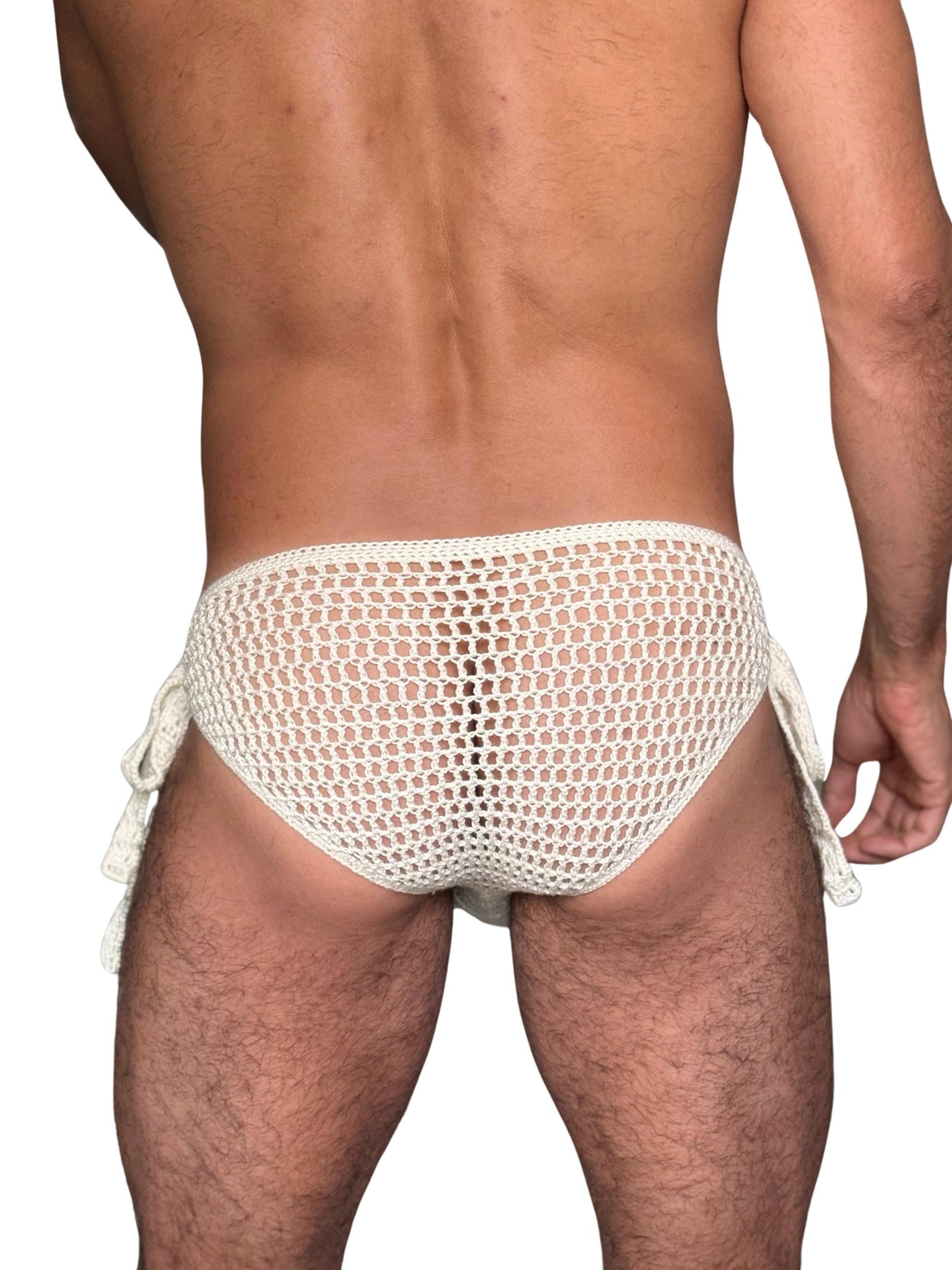 Studio back view of handmade crochet briefs with side ties, highlighting the open mesh pattern and soft fit.