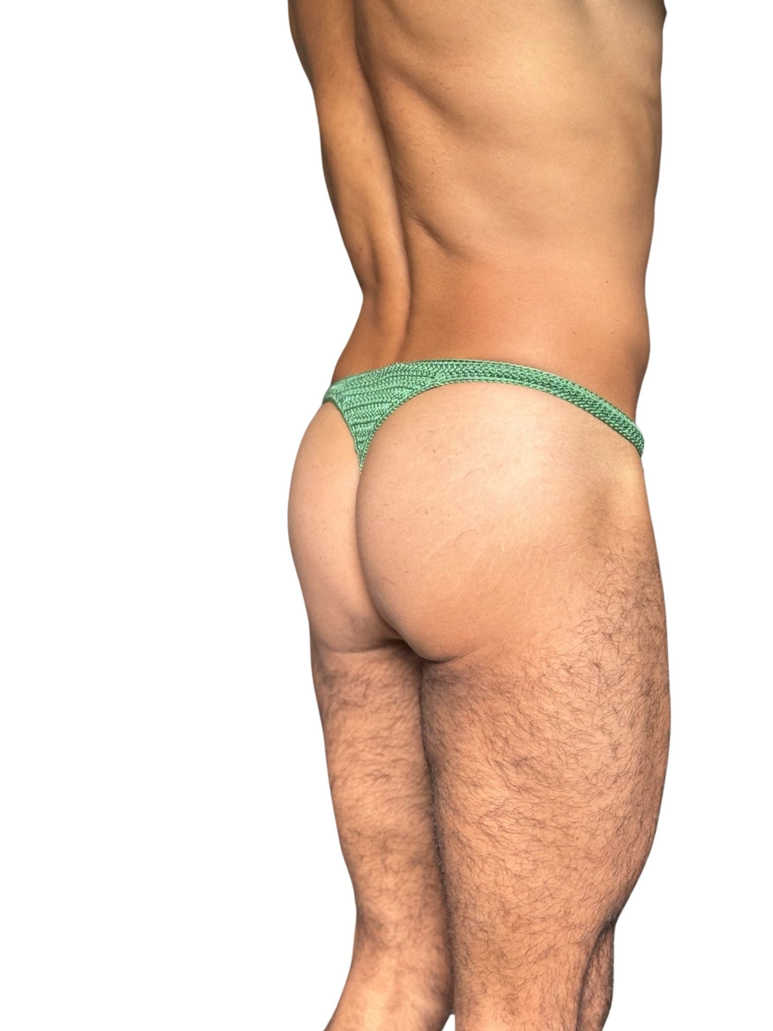 Back angle of crochet thong underwear for men, showing fit and open stitch pattern.