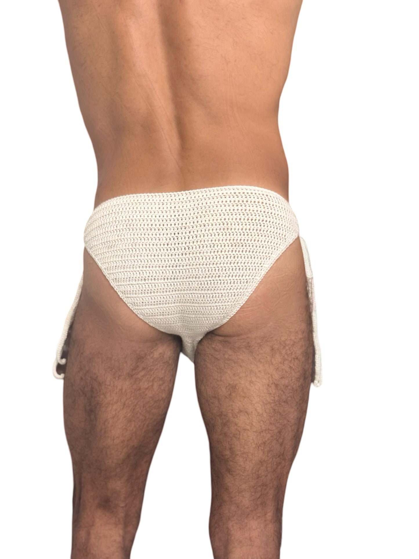 Close-up of side tie knot on crochet men’s swim briefs, showing detail and secure fastening.