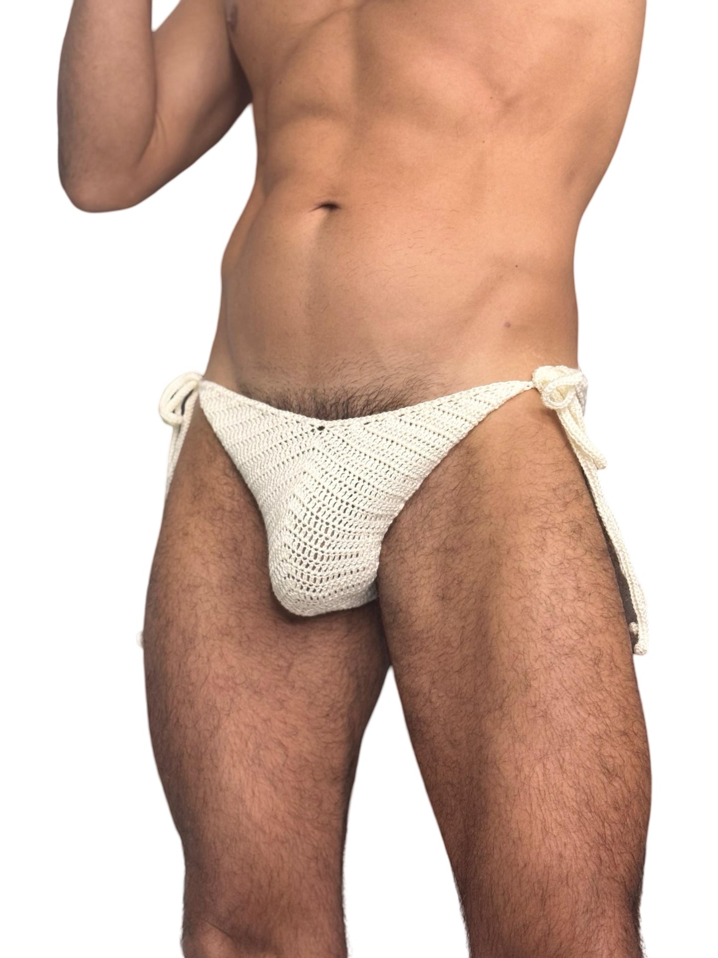 Crochet men’s tie side briefs on white background, minimalist beachwear style.