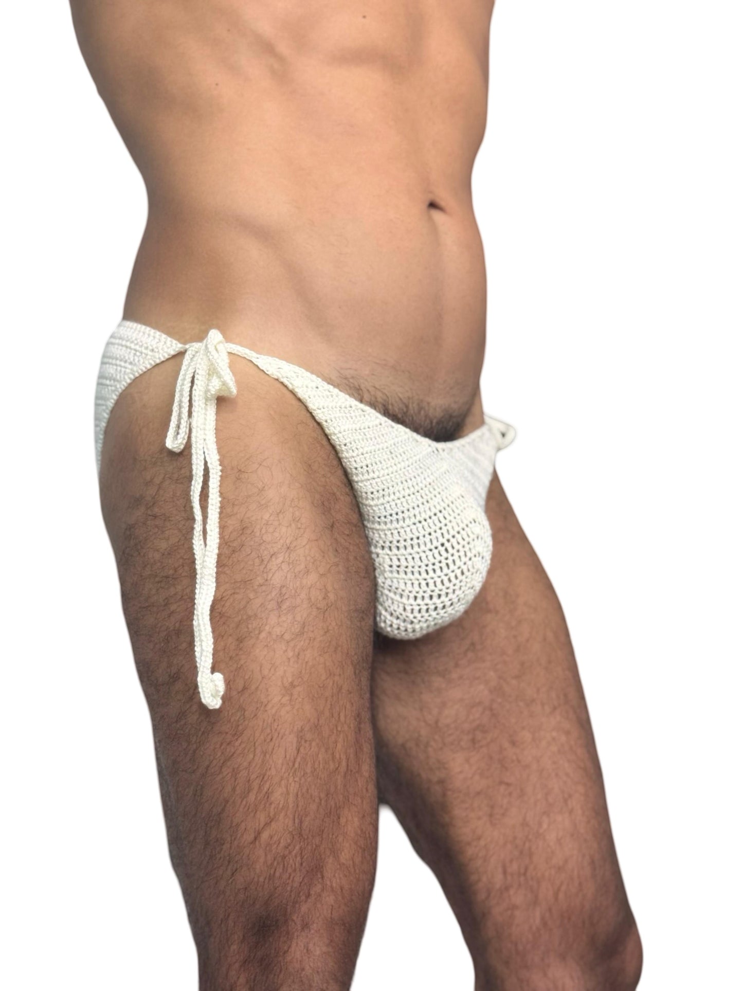 Side detailed view of crochet men’s tie side briefs on a model, ideal for beach or pool wear.
