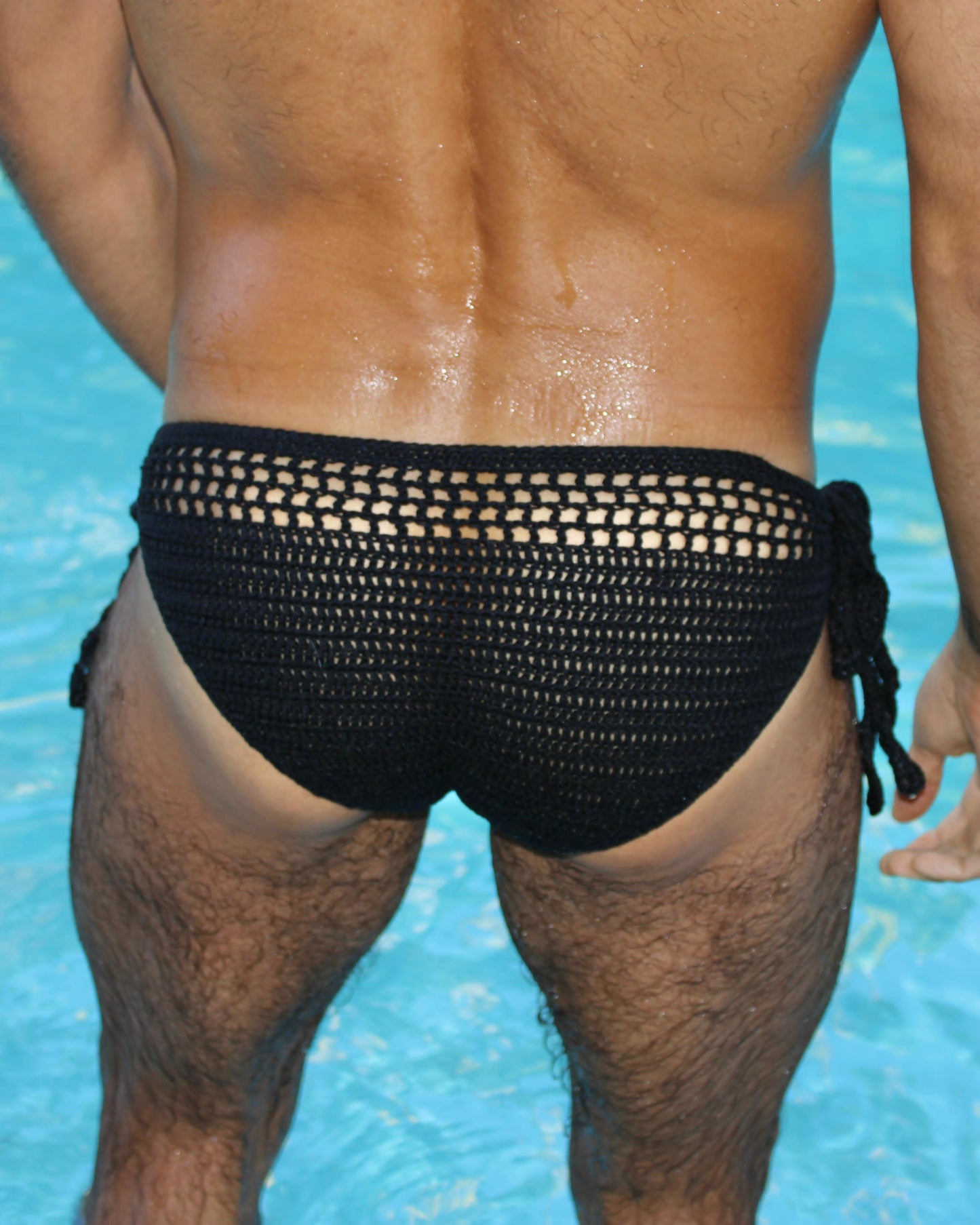Back view of men’s crochet tie side briefs, highlighting secure fit and handmade texture.