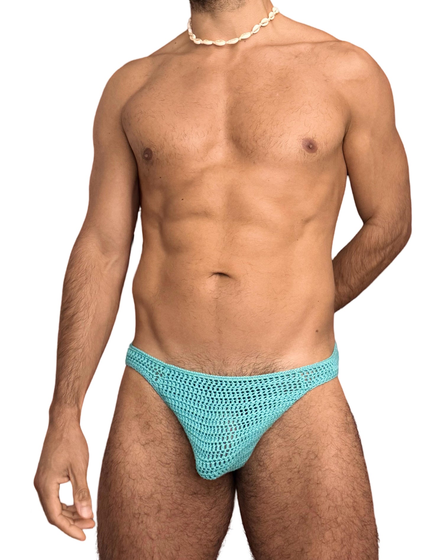 Styled photo of finished crochet briefs made using our pattern.