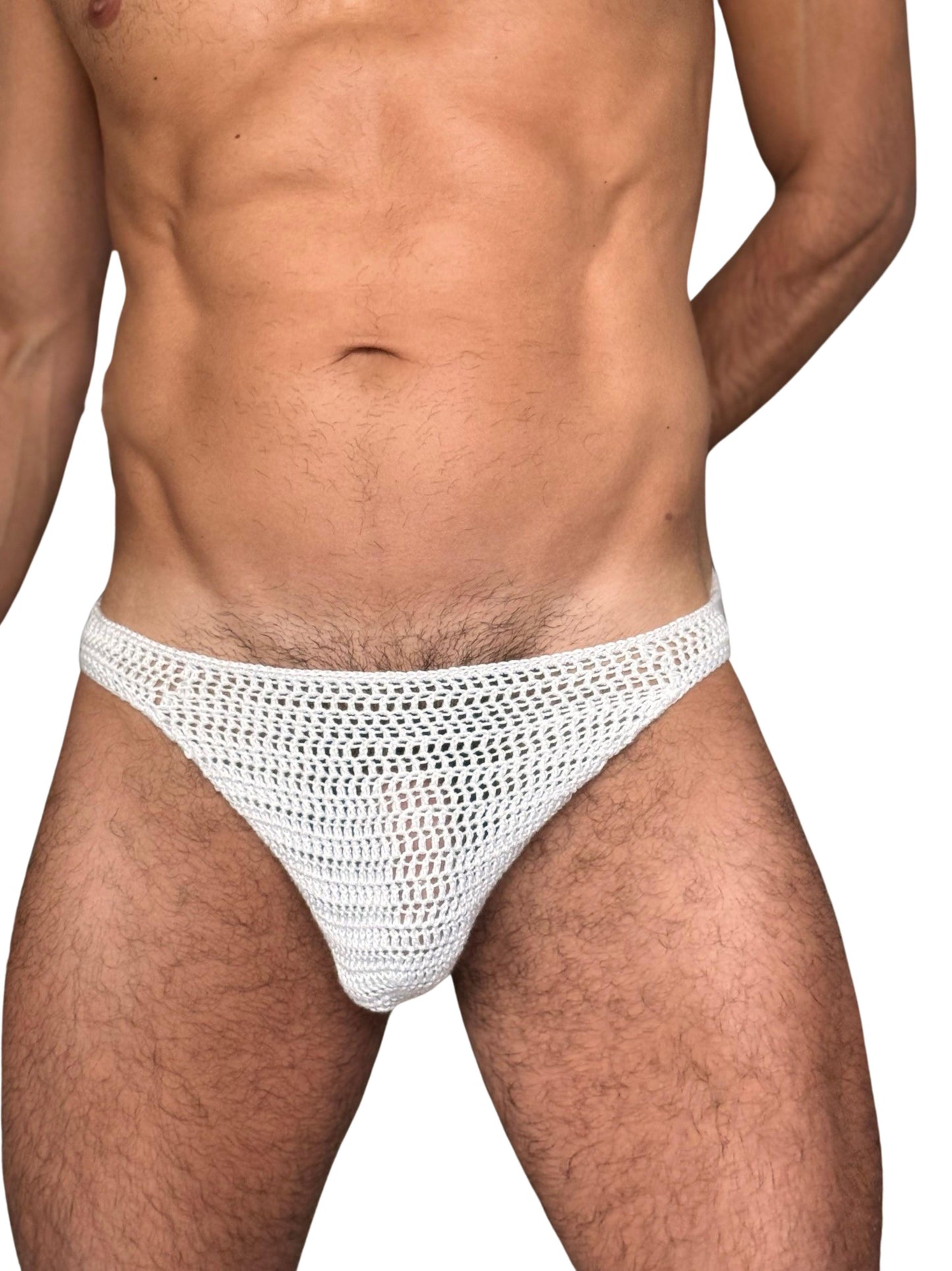 Front view of handmade crochet men's swim briefs with red heart motif, displayed on a man.