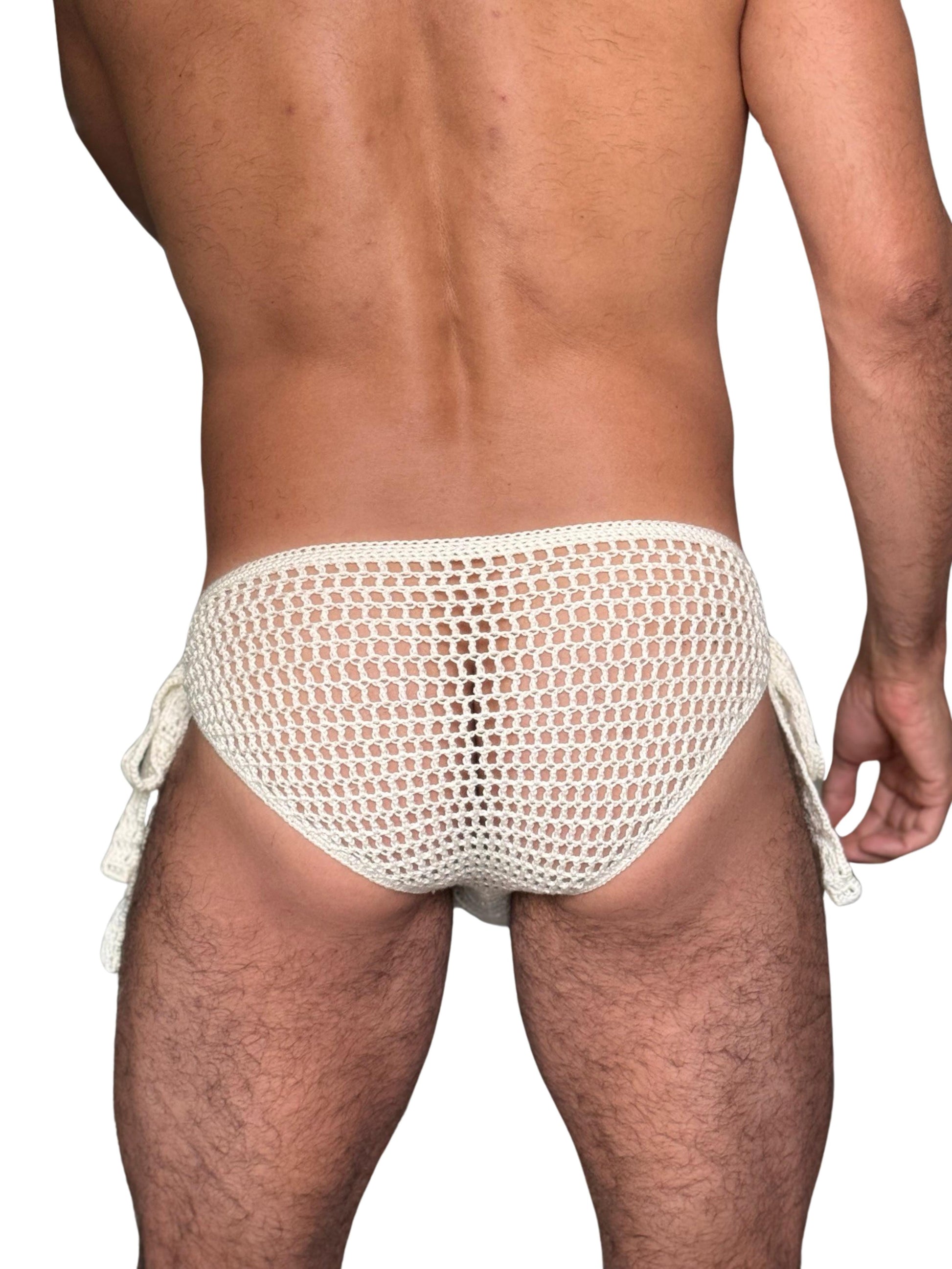 Studio back view of handmade crochet briefs with side ties, highlighting the open mesh pattern and soft fit.