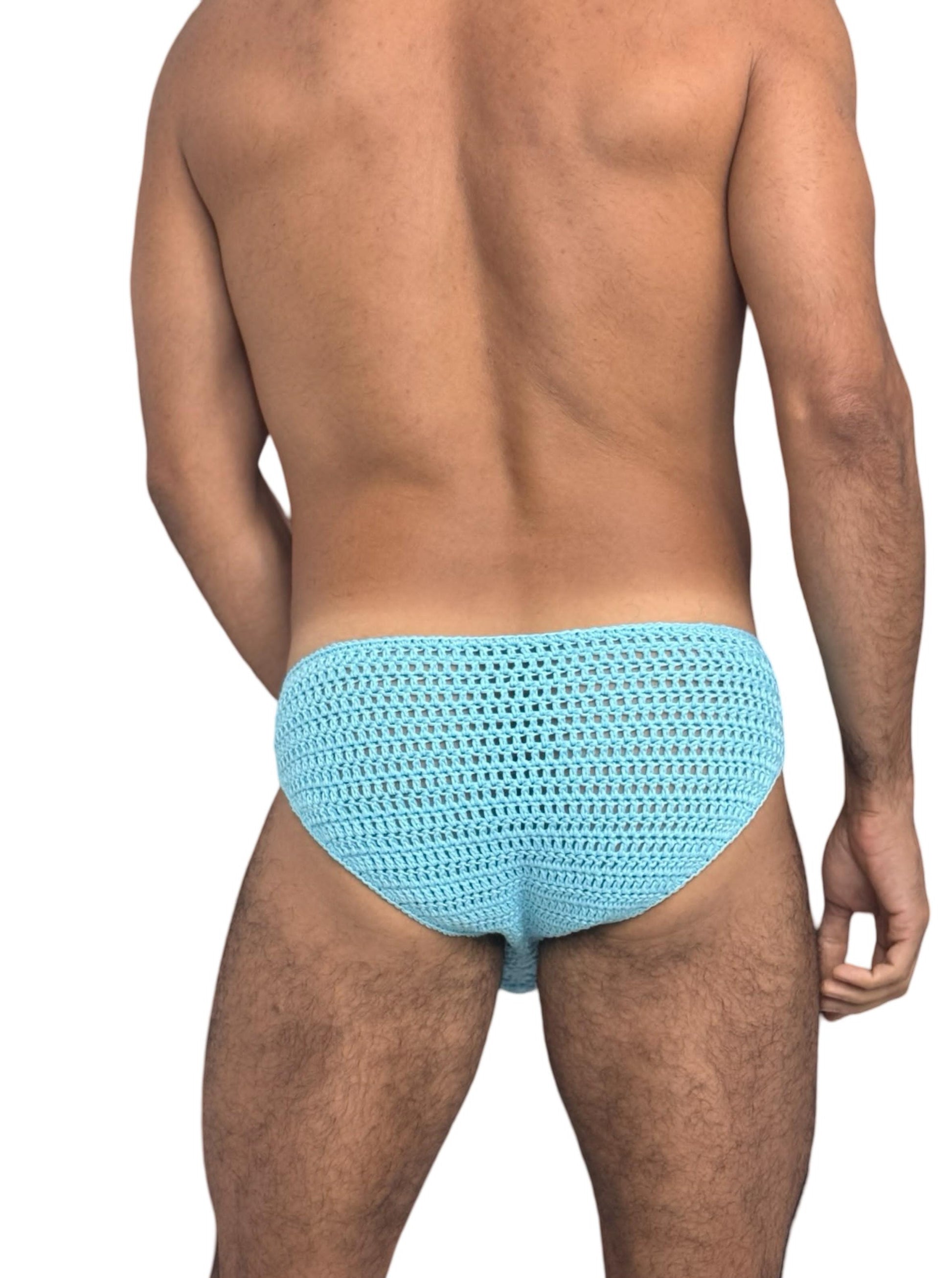 Close-up of seashell stitch detail of crochet men’s swim briefs.